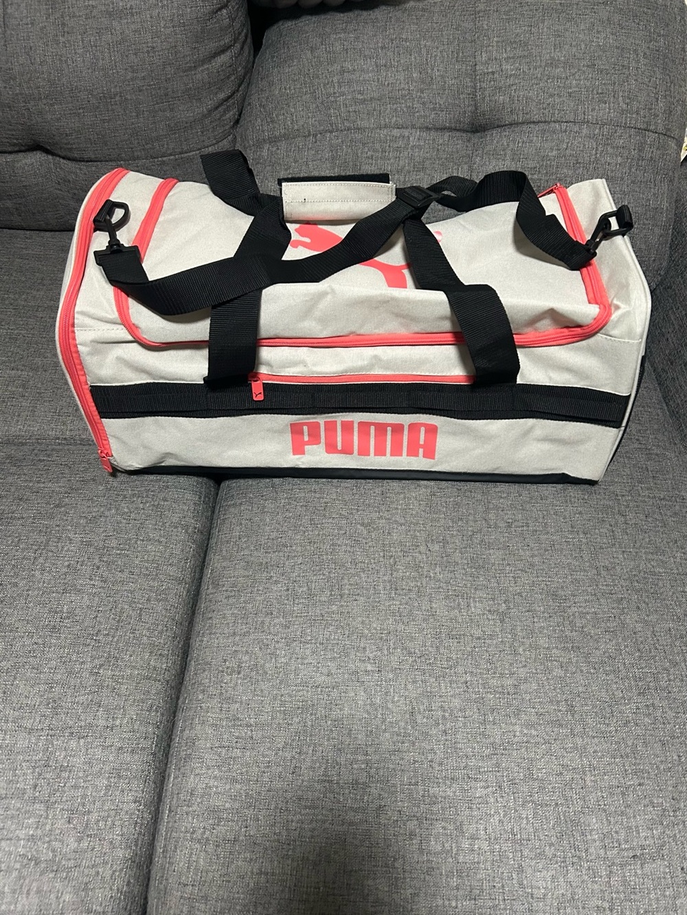 PUMA Light Gray and Coral Travel Duffel with Black Straps gym bag